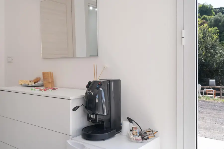 Macchina del caffè e snack per la colazione